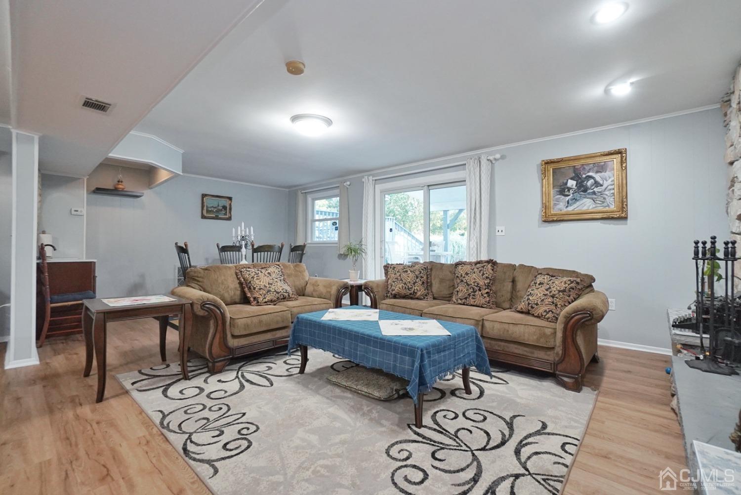 60 Annette Drive Edison, NJ 08820 - Photo 15 of 69 a living room with furniture a rug and a window