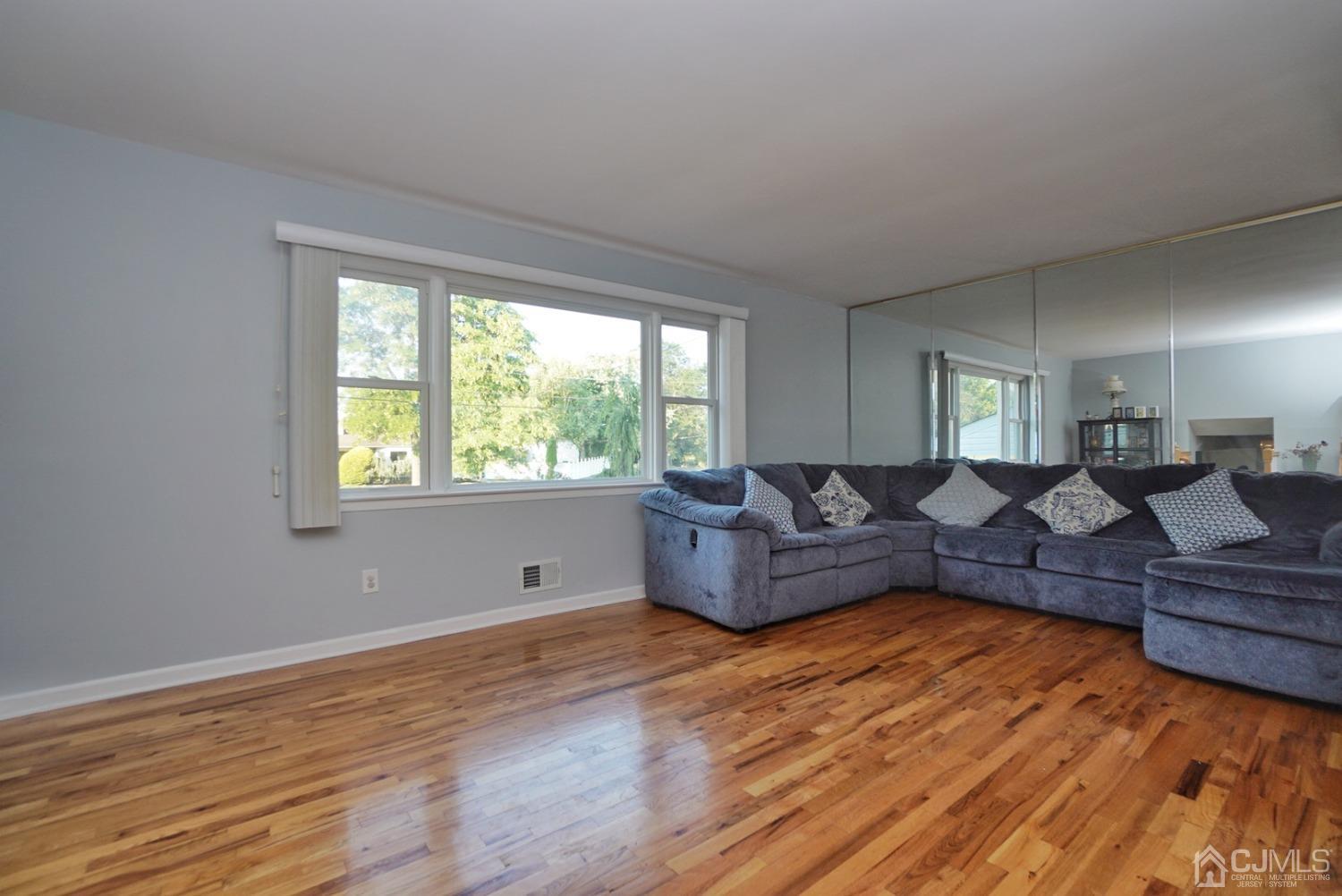 60 Annette Drive Edison, NJ 08820 - Photo 20 of 69 a living room with furniture and wooden floor