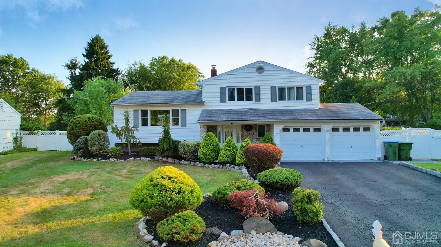 60 Annette Drive Edison, NJ 08820 - Photo 2 of 69 a view of a house with a yard and potted plants