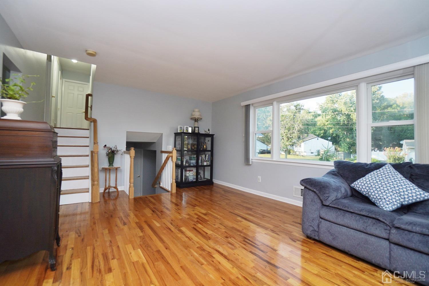 60 Annette Drive Edison, NJ 08820 - Photo 25 of 69 a living room with furniture and a wooden floor