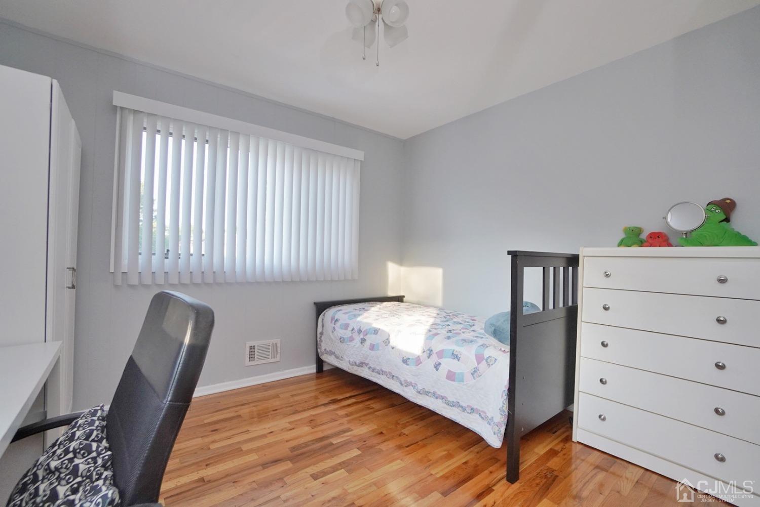 60 Annette Drive Edison, NJ 08820 - Photo 39 of 69 a bedroom with a bed and a window