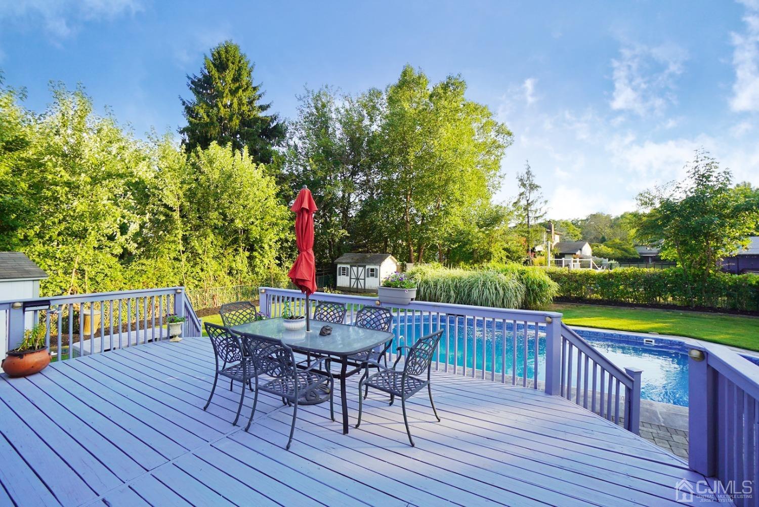 60 Annette Drive Edison, NJ 08820 - Photo 55 of 69 a view of a table and chairs on the roof deck