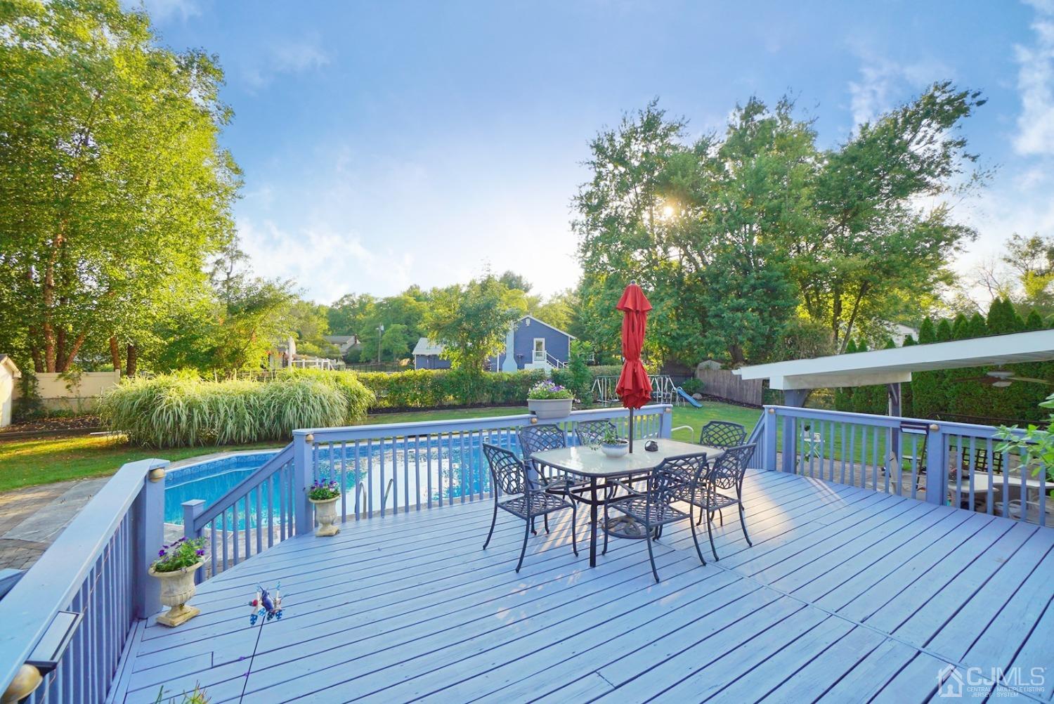 60 Annette Drive Edison, NJ 08820 - Photo 56 of 69 a view of a deck with furniture and garden