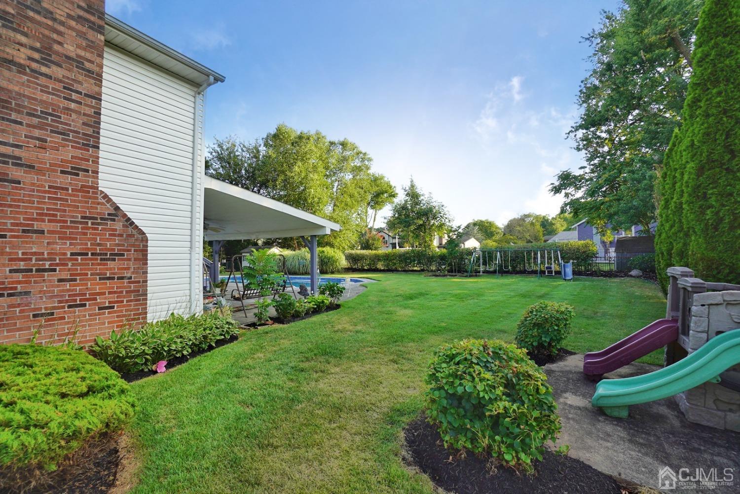 60 Annette Drive Edison, NJ 08820 - Photo 57 of 69 a view of a house with a backyard