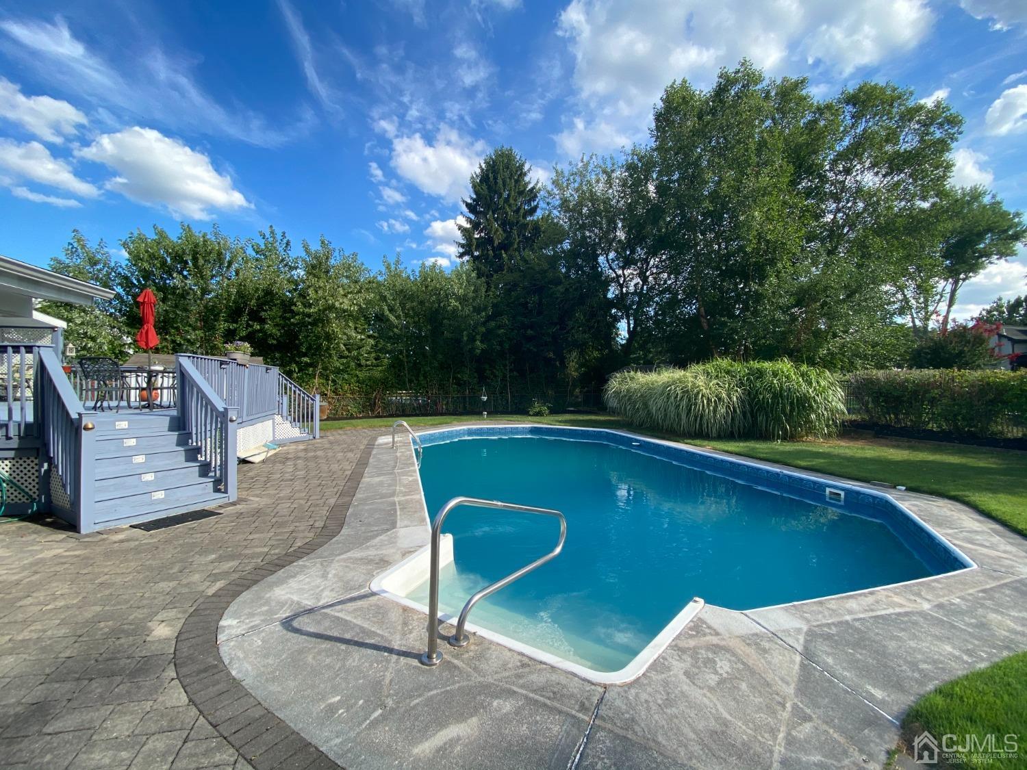 60 Annette Drive Edison, NJ 08820 - Photo 62 of 69 a view of a swimming pool with a patio