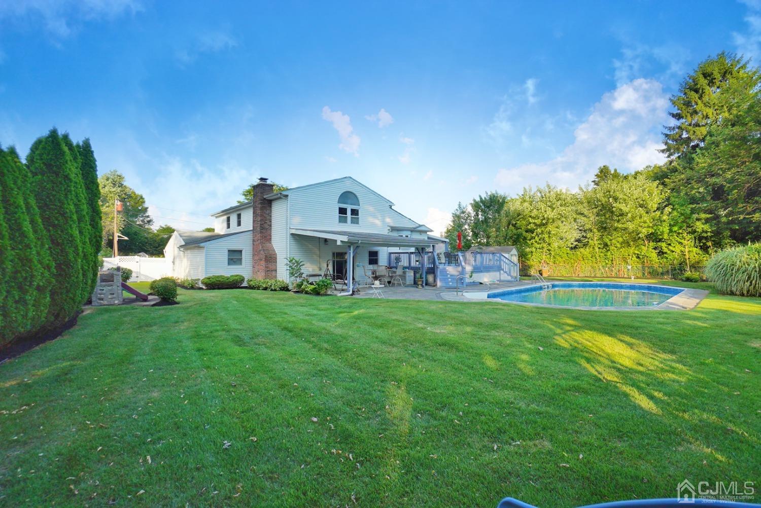 60 Annette Drive Edison, NJ 08820 - Photo 66 of 69 a front view of a house with garden