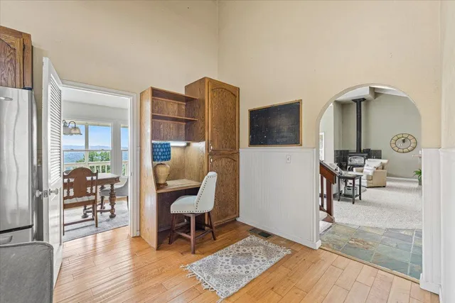 a dining room with furniture and window