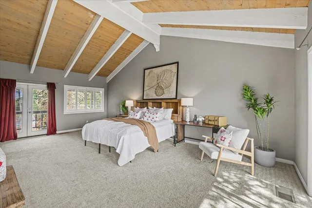 a living room with a bed and furniture