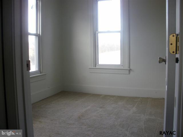 350 Kendale Road Red Lion, PA 17356 - Photo 15 of 24 an empty room with a window