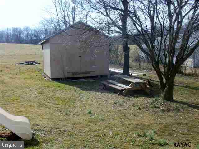 350 Kendale Road Red Lion, PA 17356 - Photo 20 of 24 a backyard of a house with lots of green space