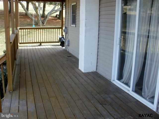 350 Kendale Road Red Lion, PA 17356 - Photo 4 of 24 an empty room with wooden floor and windows