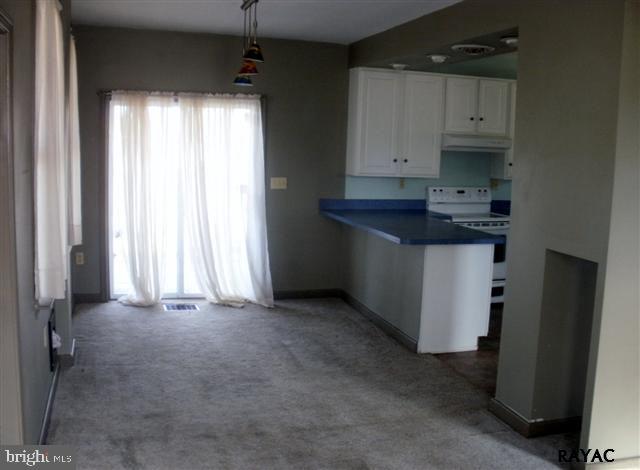 350 Kendale Road Red Lion, PA 17356 - Photo 8 of 24 an empty room with an entryway and a window