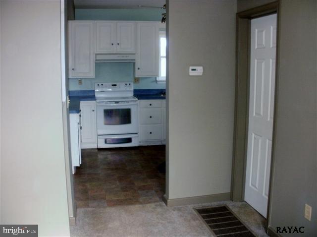 350 Kendale Road Red Lion, PA 17356 - Photo 9 of 24 a kitchen with a stove and a refrigerator
