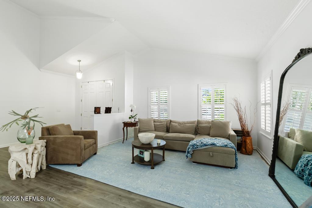 3139 Ashgrove Road Jacksonville, FL 32226 - Photo 23 of 81 a living room with furniture and a flat screen tv