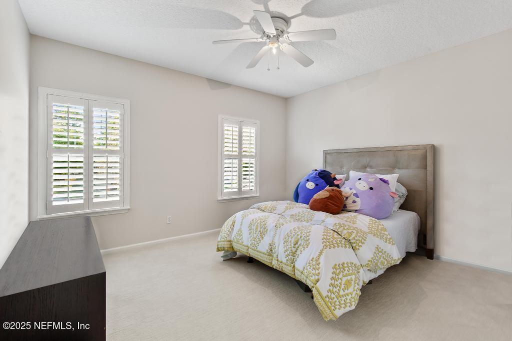 3139 Ashgrove Road Jacksonville, FL 32226 - Photo 56 of 81 a bedroom with a bed and a window