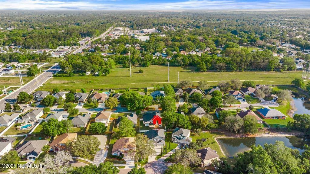 3139 Ashgrove Road Jacksonville, FL 32226 - Photo 77 of 81 an aerial view of a city with lots of residential buildings ocean and mountain view in back