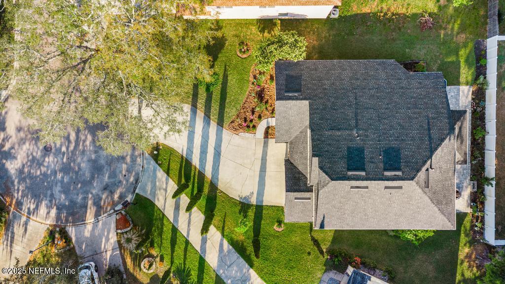 3139 Ashgrove Road Jacksonville, FL 32226 - Photo 9 of 81 an aerial view of a house with a yard basket ball court and outdoor seating