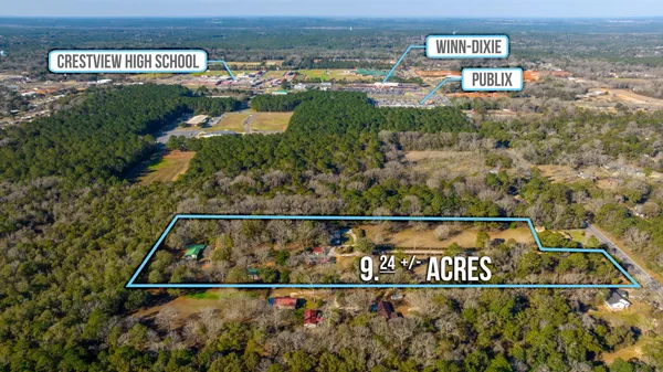 a view of a street with a building in the background