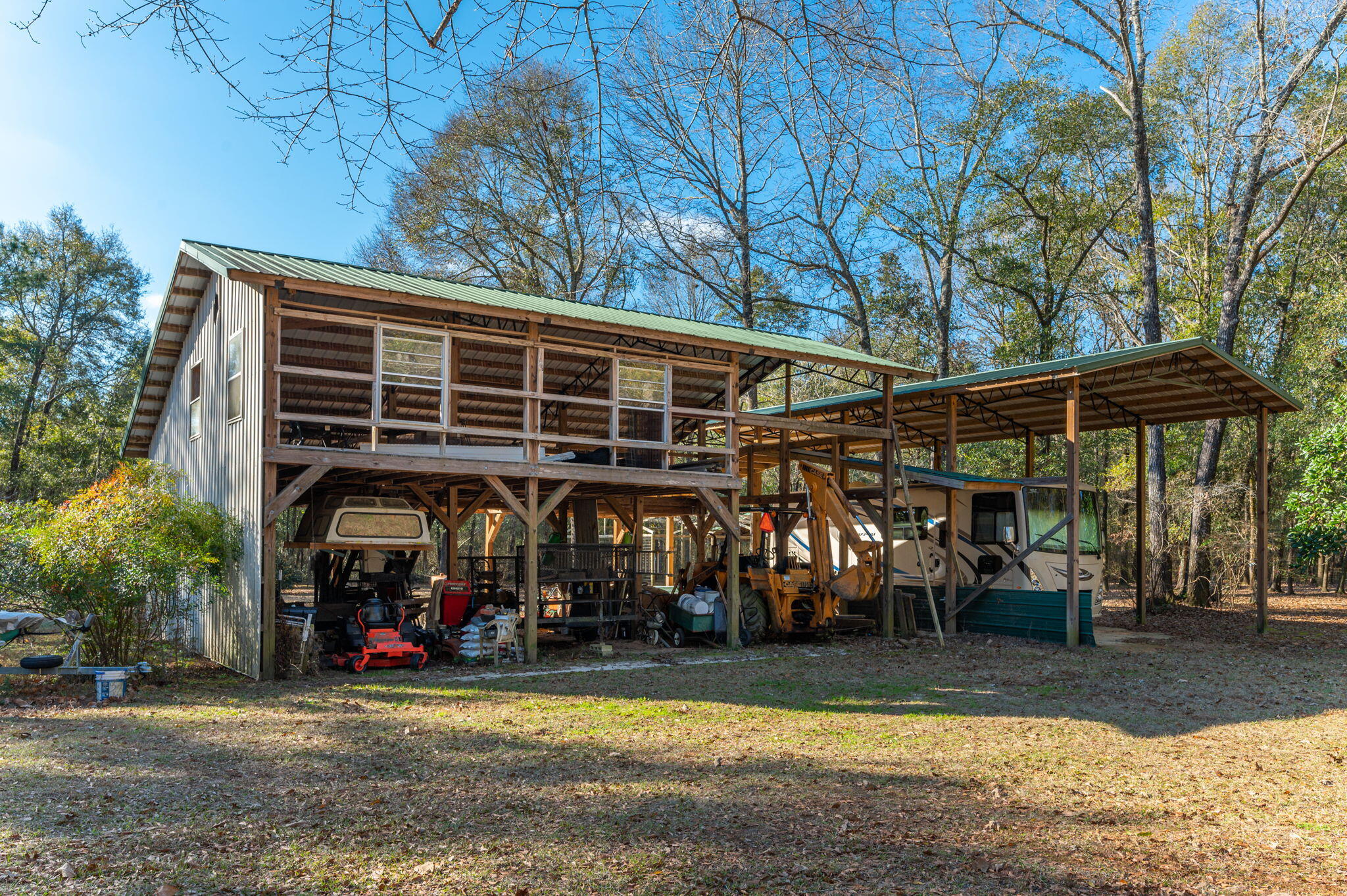 5771 Flora Lee Lane Crestview, FL 32539 - Photo 19 of 66 a view of a chairs and tables in patio