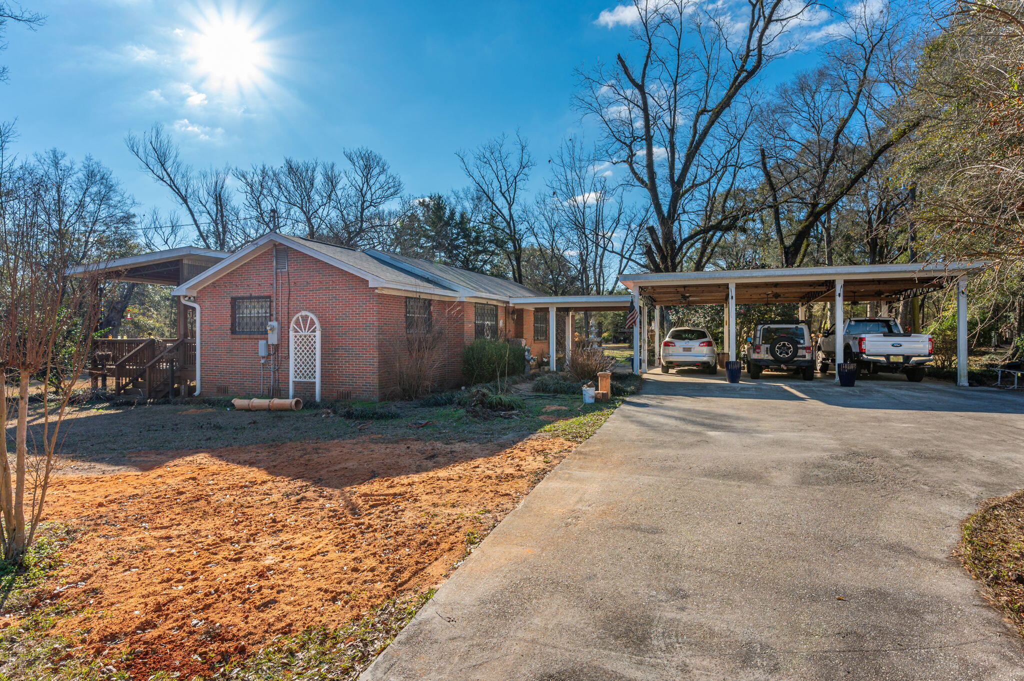 5771 Flora Lee Lane Crestview, FL 32539 - Photo 24 of 66 a view of house with outdoor space and trees