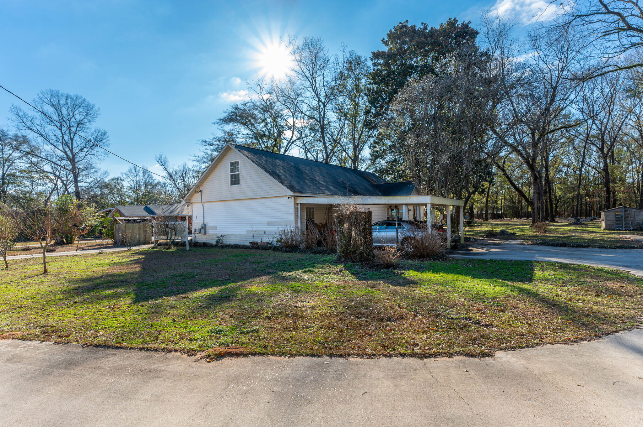 5771 Flora Lee Lane Crestview, FL 32539 - Photo 27 of 66 a front view of a house with garden