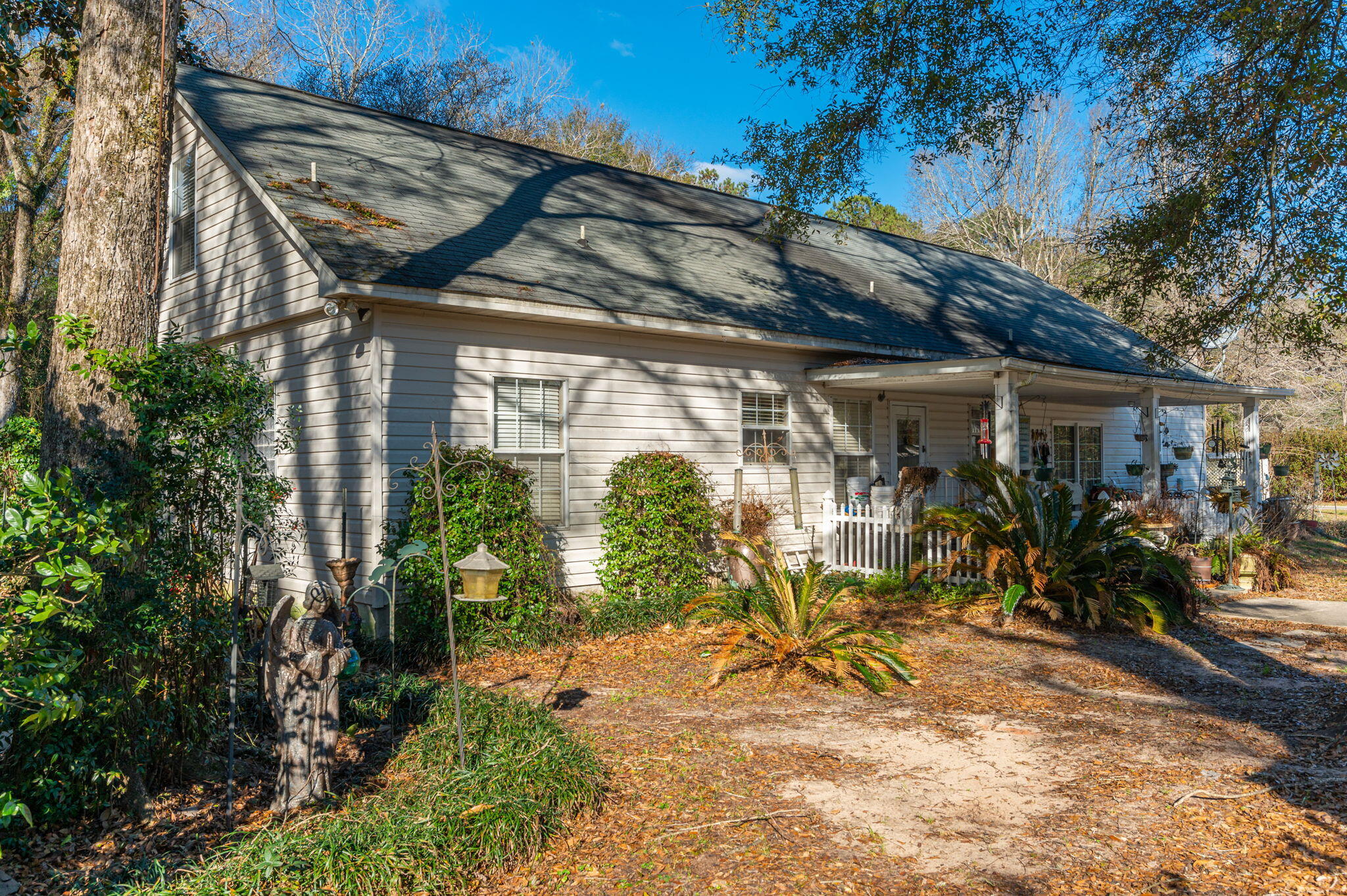 5771 Flora Lee Lane Crestview, FL 32539 - Photo 28 of 66 a view of a house with yard and sitting area