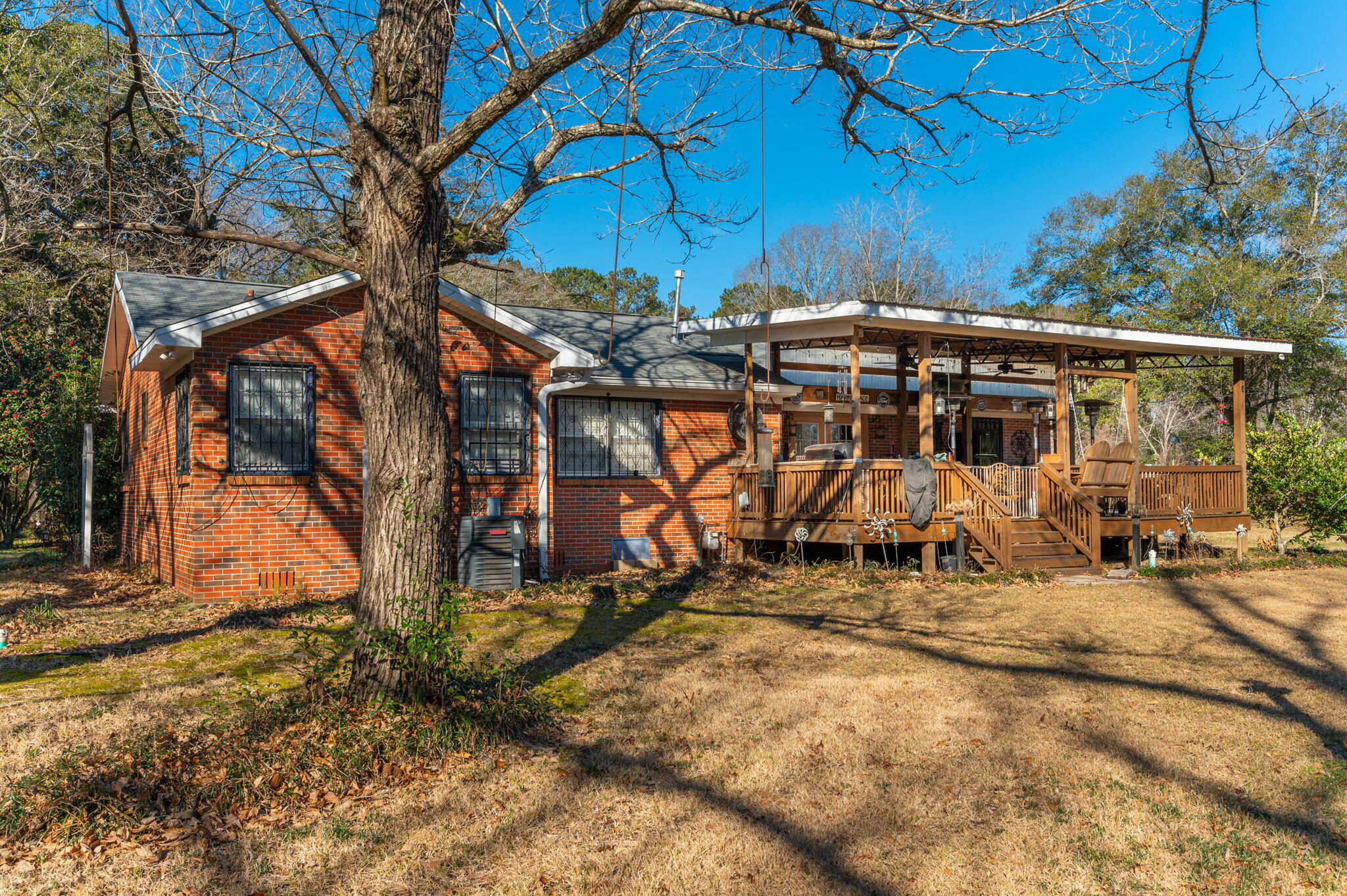5771 Flora Lee Lane Crestview, FL 32539 - Photo 42 of 66 a view of a house with large trees