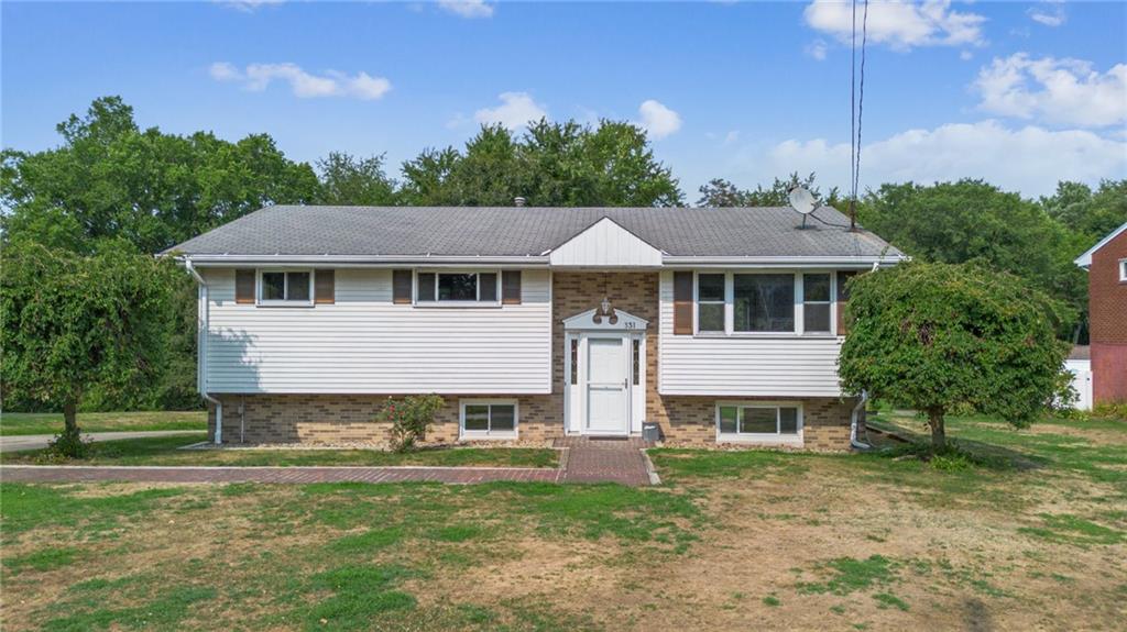 331 East Union Road Cheswick, PA 15024 - Photo 1 of 26 a front view of a house with a yard and green space