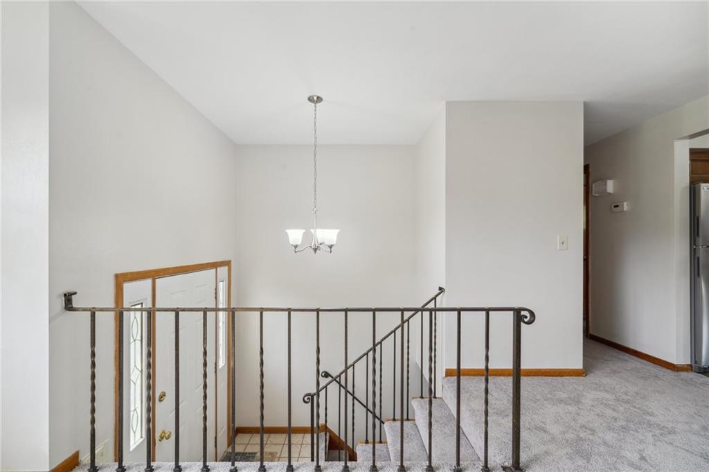331 East Union Road Cheswick, PA 15024 - Photo 2 of 26 a view of staircase with railing and white walls