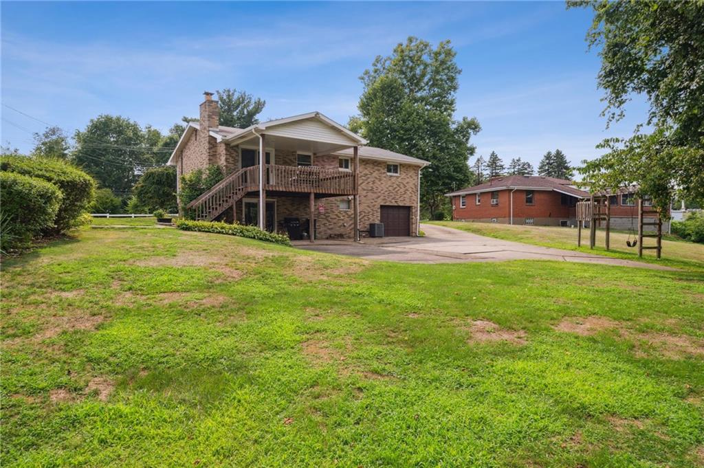 331 East Union Road Cheswick, PA 15024 - Photo 22 of 26 a view of a house with a big yard and large trees