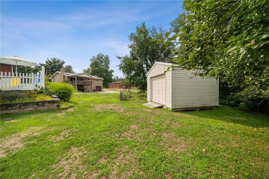 331 East Union Road Cheswick, PA 15024 - Photo 25 of 26 a view of a house with backyard and garden