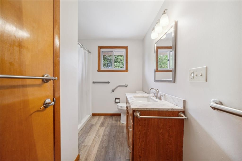 331 East Union Road Cheswick, PA 15024 - Photo 9 of 26 a bathroom with a sink a mirror and a shower