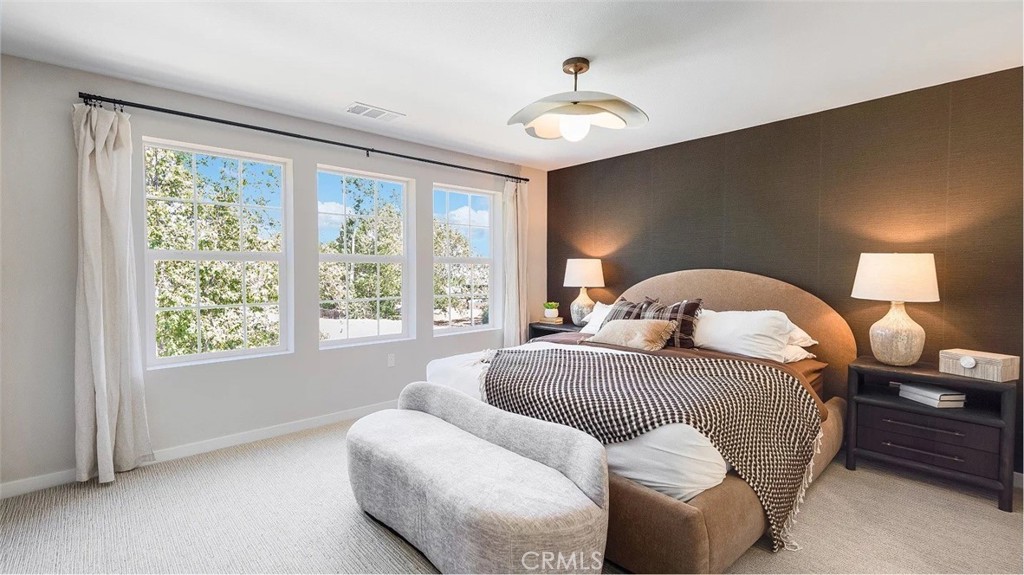 8451 Tapia Way Rancho Cucamonga, CA 91730 - Photo 14 of 26 a bedroom with bed and window