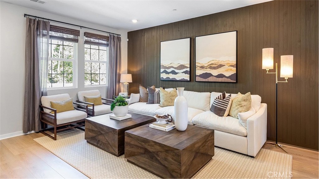 8451 Tapia Way Rancho Cucamonga, CA 91730 - Photo 7 of 26 a living room with furniture and a large window