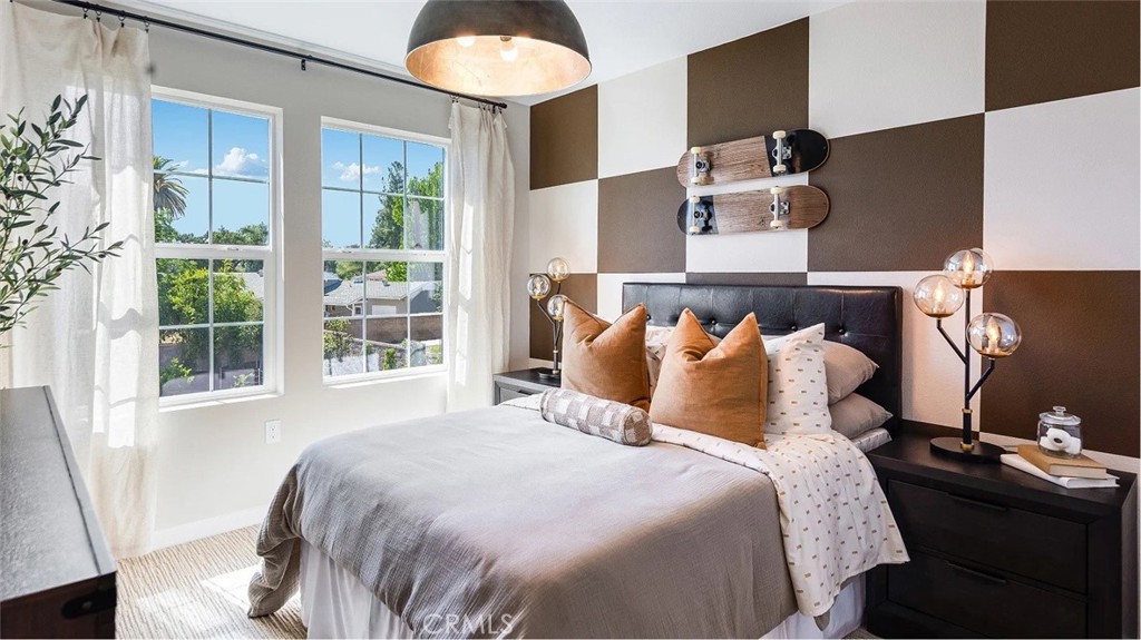 8451 Tapia Way Rancho Cucamonga, CA 91730 - Photo 8 of 26 a bedroom with bed and window