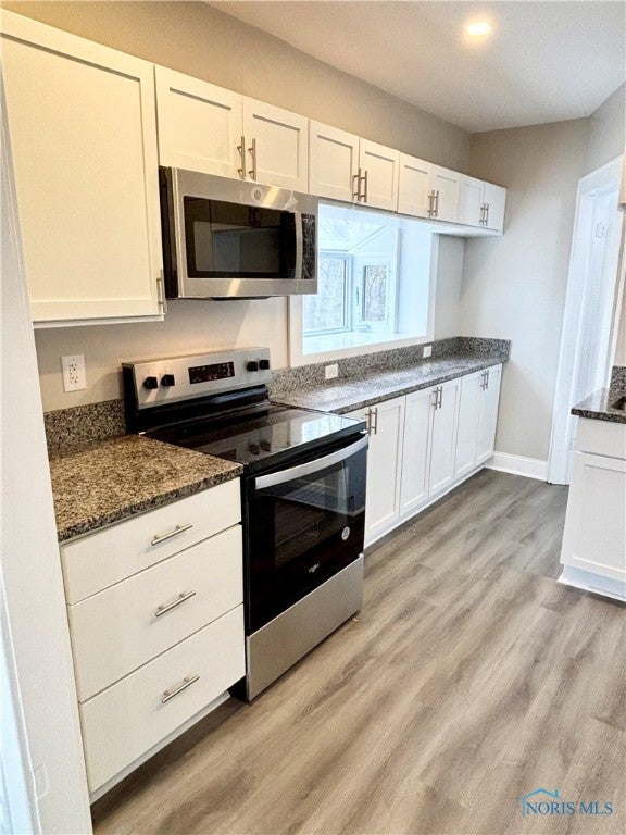 2097 Maginnis Road Oregon, OH 43616 - Photo 6 of 39 Granite counters.