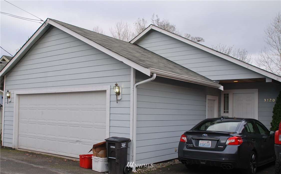 3120 12th Street Everett, WA 98201 - Photo 1 of 12 a view of a car in front of a house
