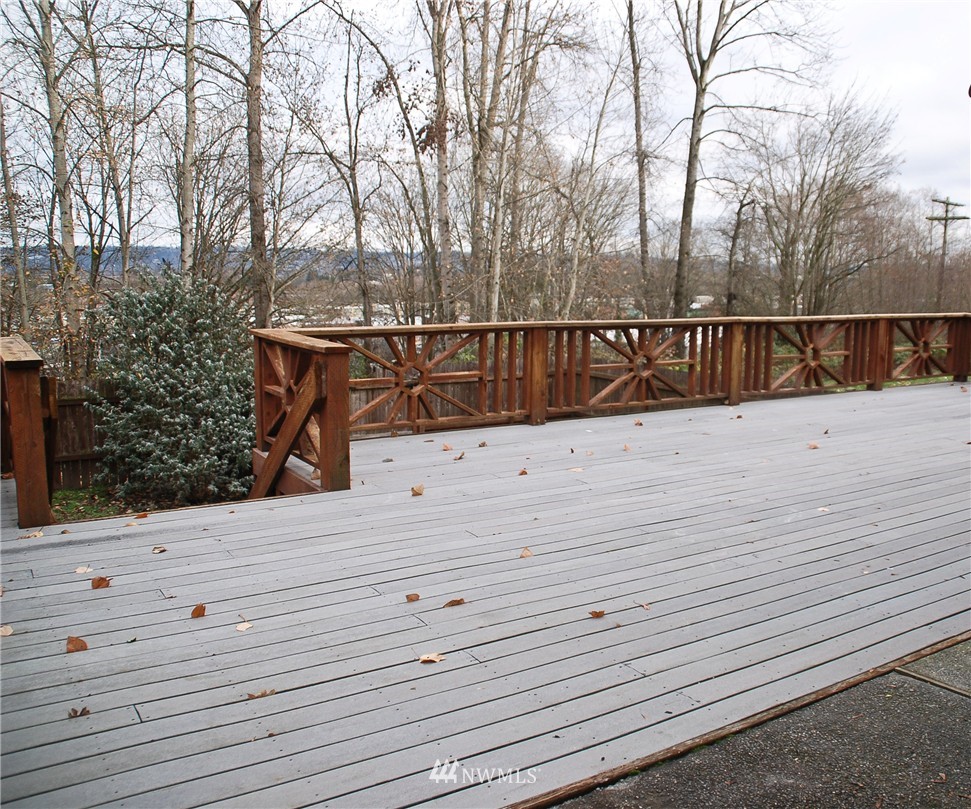 3120 12th Street Everett, WA 98201 - Photo 11 of 12 a view of pathway with a wrought fence