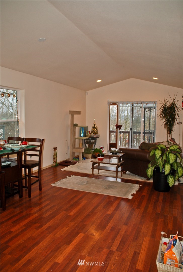 3120 12th Street Everett, WA 98201 - Photo 3 of 12 a living room with furniture and wooden floor