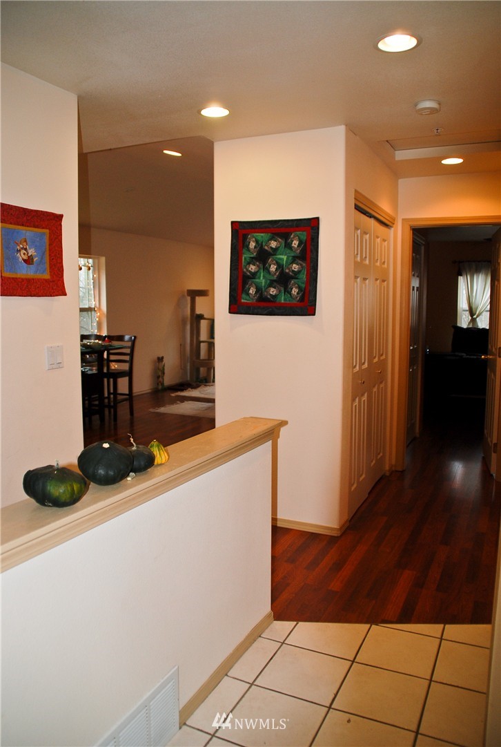 3120 12th Street Everett, WA 98201 - Photo 4 of 12 a kitchen with stainless steel appliances a refrigerator and a stove