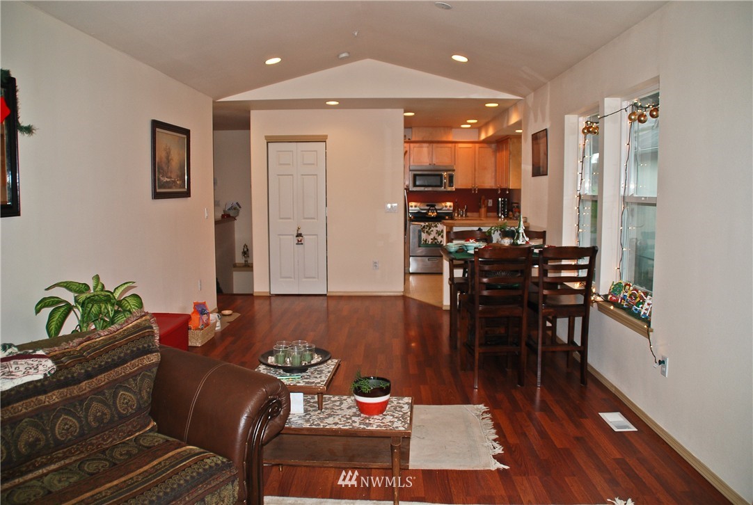 3120 12th Street Everett, WA 98201 - Photo 5 of 12 a living room with furniture and wooden floor
