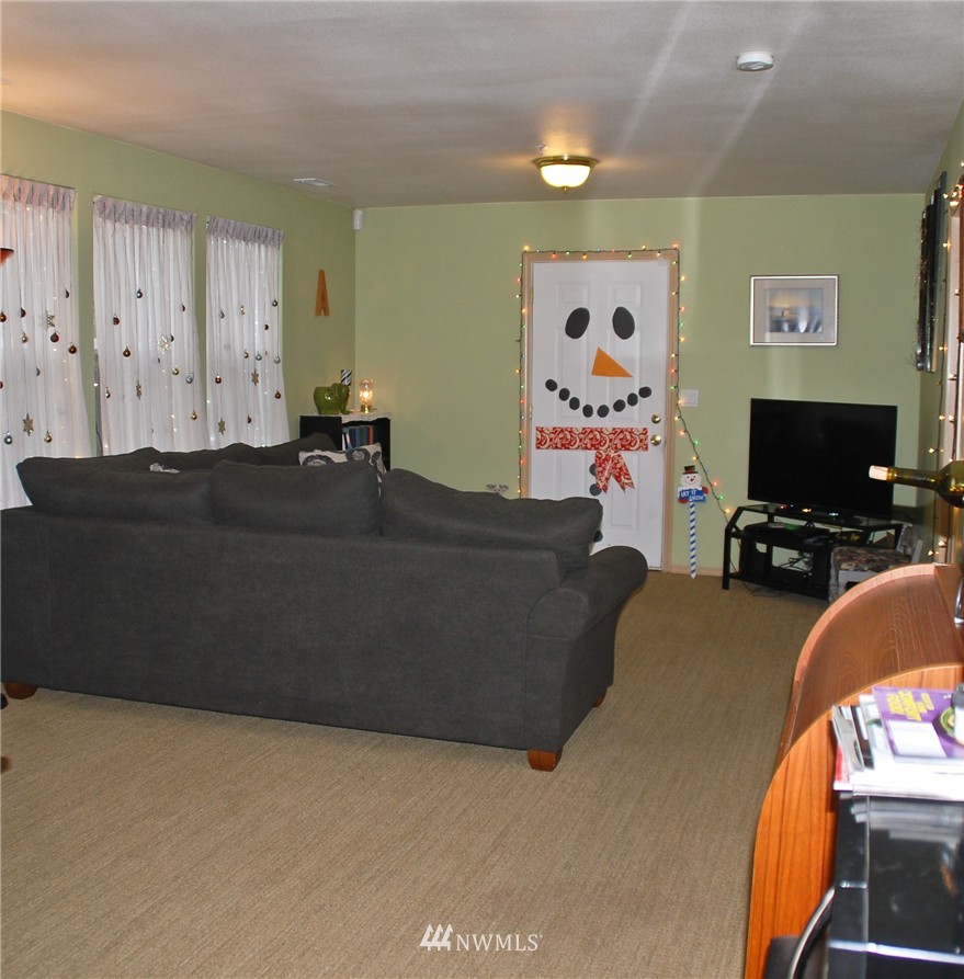 3120 12th Street Everett, WA 98201 - Photo 7 of 12 a bedroom with a bed and dresser