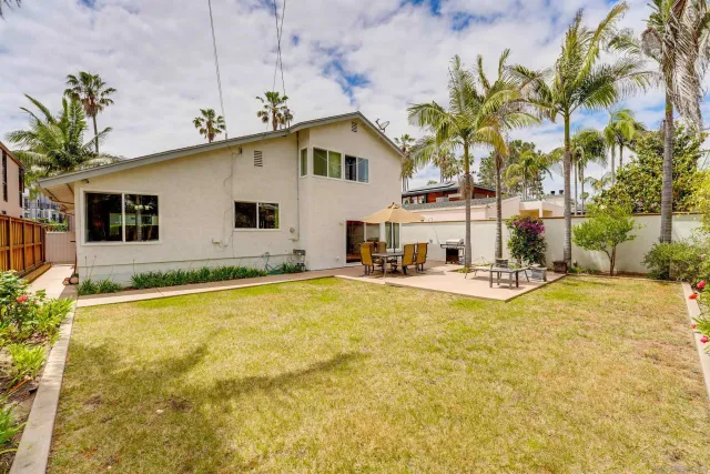 a view of a house with swimming pool
