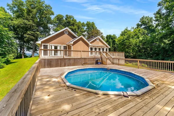 a view of a house with a swimming pool