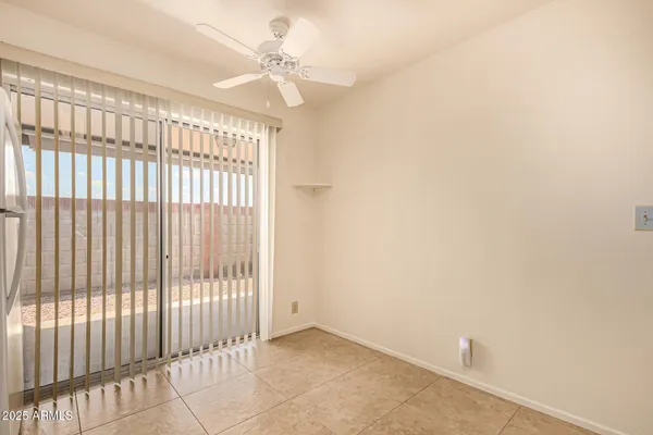 a view of a backyard with a sitting area