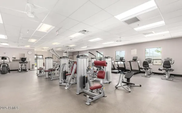 a view of a house with swimming pool and porch