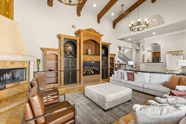 a view of a living room and entry way