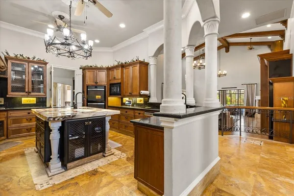 a view of a livingroom with furniture workspace and a window
