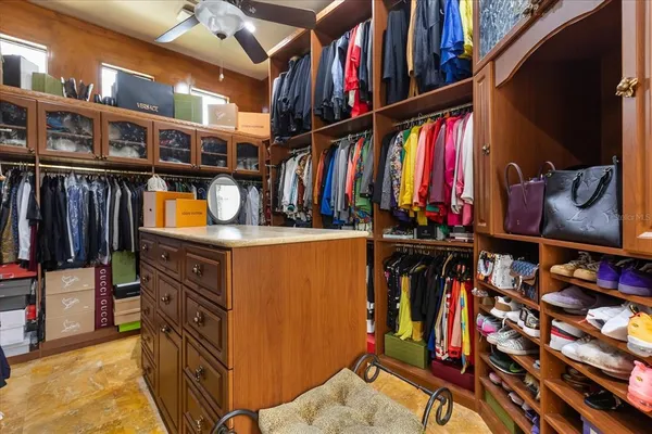 a kitchen with sink cabinets and window