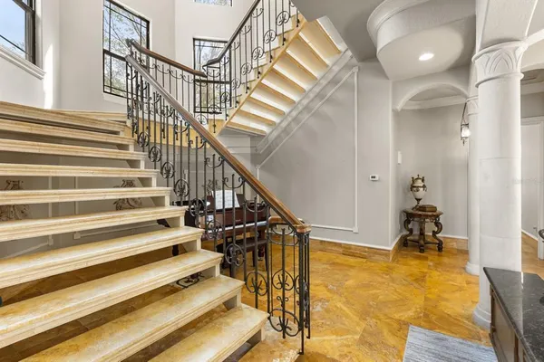 a bathroom with a double vanity sink mirror and toilet